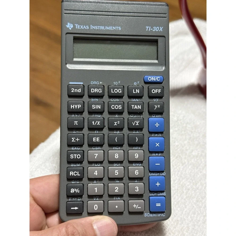 Texas Instruments TI-30X Solar Calculator With Cover And Manual. Needs Battery